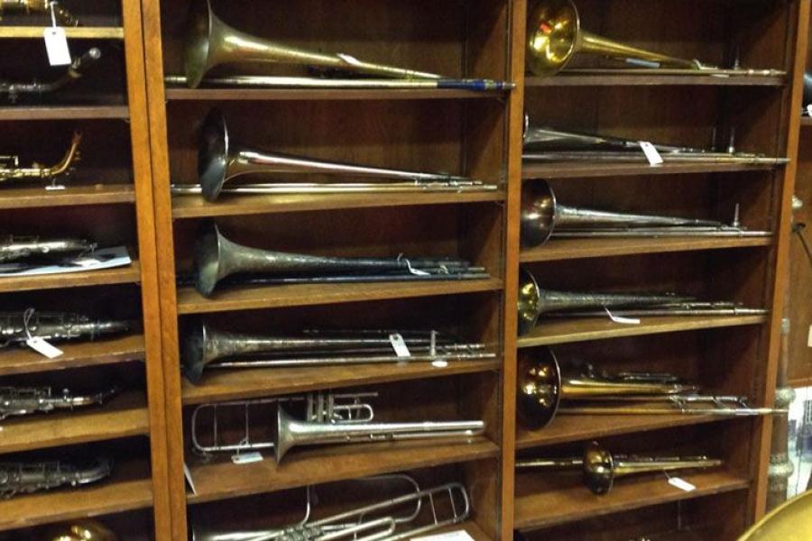 A collection of trombones and saxophones