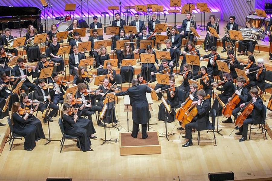 Dr. Leslie B. Dunner conducts the Arts Academy Orchestra in Miami